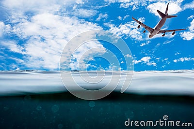 Underwater wave surface with airplane on sky Stock Photo