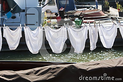 Underwear on a clothesline on a ship Stock Photo