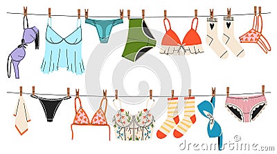 Underwear on ropes. Women panties and bras drying on clothesline, beautiful ladies lingerie, color female undergarment Stock Photo