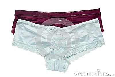 Underwear woman isolated. Close-up of luxurious elegant lilac color and a light blue satin lacy thongs panties isolated on a white Stock Photo
