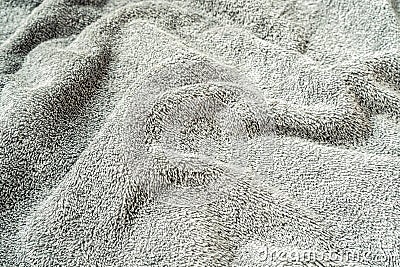 Undulating grey plush bath towel fabric Stock Photo