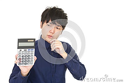 Uneasy Asian man Stock Photo