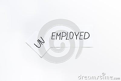 Unemployed - employed - torn paper sheet on white background top view. Hiring concept. Stock Photo