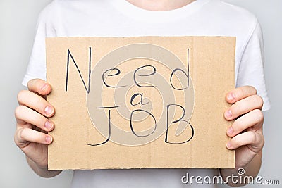 Unemployed woman hold sign need a job Stock Photo
