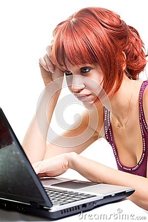 Unemployed woman searching online for job Stock Photo