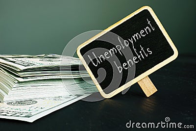 Unemployment benefits is shown on the business photo using the text Stock Photo