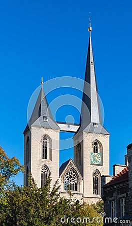 Unequal towers of early gothic St. Martini church in Halberstadt Stock Photo