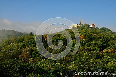 A distant Wartburg Castle in Eisenach, Thuringia Stock Photo