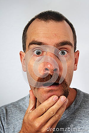 Uneven moustache surprise Stock Photo