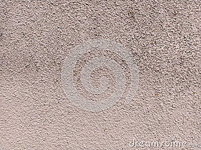 Uneven rough pink concrete wall. Background or texture Stock Photo