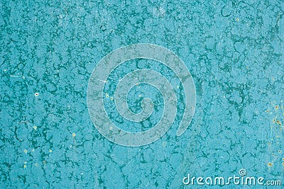 Unevenly colored surface with spots. Blue background with paint spots. Painted wall texture Stock Photo