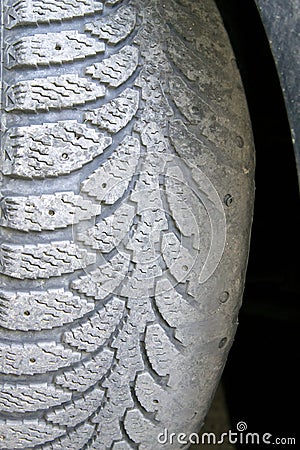 Unevenly worn car tire. Dangerous Stock Photo