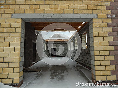 Unfinished block house construction in winter Stock Photo