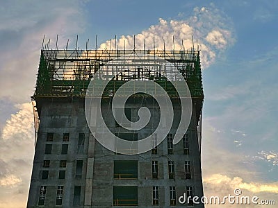 Unfinished building in the sunset Stock Photo