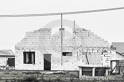 Unfinished construction in rural area. Unfinished building outdoor house in the village Stock Photo