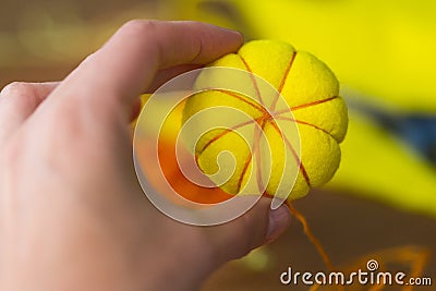 Unfinished decorative yelllow pumpkin Stock Photo