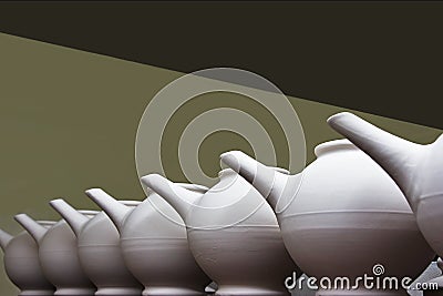 Unfired Clay Teapots in a Row Stock Photo