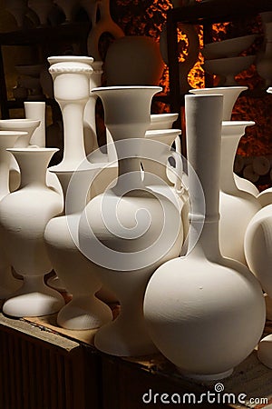 Unfired greenware vases and pots Stock Photo
