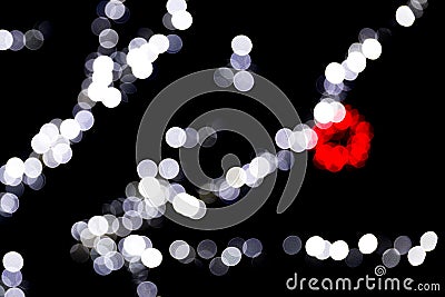 Unfocused abstract colourful bokeh with red and blue lamp on black background. defocused and blurred many round light Stock Photo