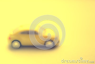 Unfocused blurred yellow car closeup, side view Stock Photo