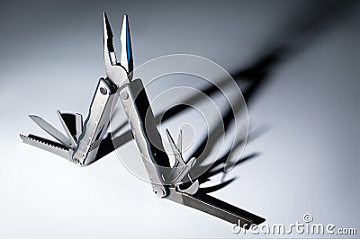 Unfolded multitool Stock Photo