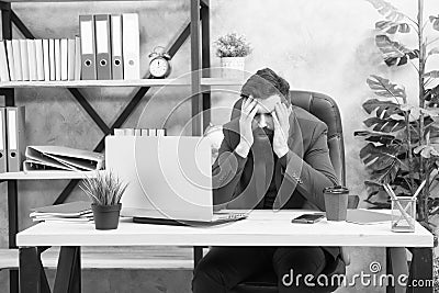 Unforgivable mistake. Falling stock prices. Man bearded boss sit office with laptop. Manager solving business problems Stock Photo