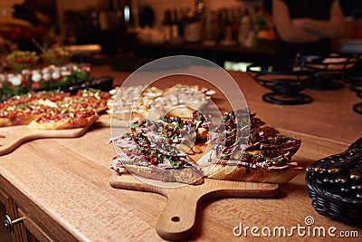 Unformal fourchette table with small bruschettas Stock Photo