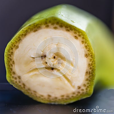 Close-up of Cross section of banana that looks like an unhappy or sad face. Stock Photo