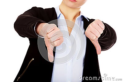 Unhappy businesswoman with thumbs down gesture Stock Photo
