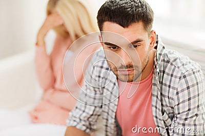 Unhappy couple having argument at home Stock Photo