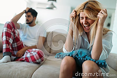 Unhappy couple having crisis and difficulties in relationship Stock Photo