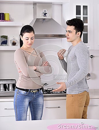 Unhappy couple in the kitchen Stock Photo