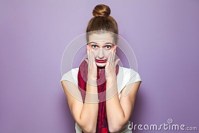 Unhappy emotional expression concept on purple background. Stock Photo