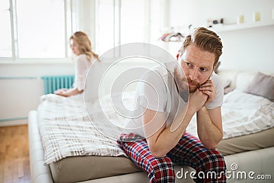 Unhappy married couple on verge of divorce due to impotence Stock Photo