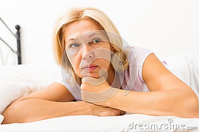 Unhappy mature female Stock Photo