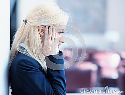 Unhappy young business woman Stock Photo
