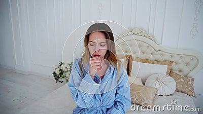 Portrait of Female Suffering From Cold Cough and Sore Throat, Looking at Camera Stock Photo