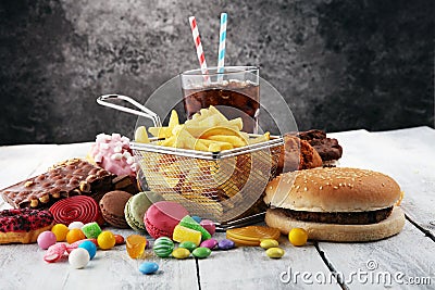 Unhealthy products. food bad for figure, skin, heart and teeth. Stock Photo