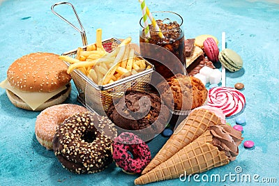 Unhealthy products. food bad for figure, skin, heart and teeth. Stock Photo