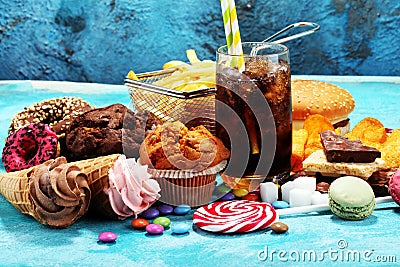Unhealthy products. food bad for figure, skin, heart and teeth. Stock Photo