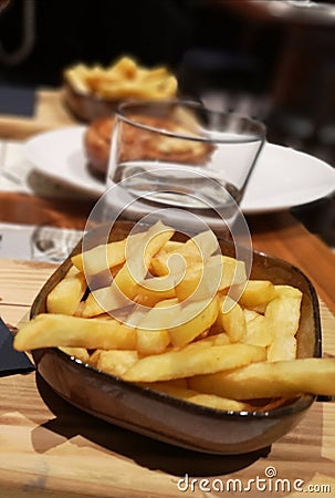 Unhealthy But Tasty / French Fries Served in Style Stock Photo