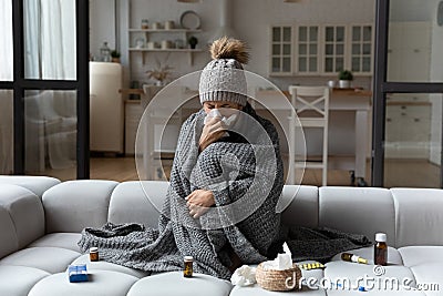 Unhealthy woman feel sick suffer from flu at home Stock Photo