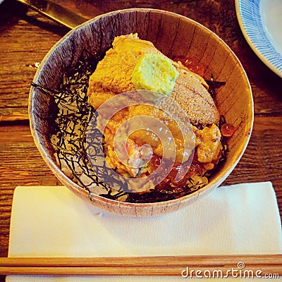 Uni sashimi over rice Stock Photo