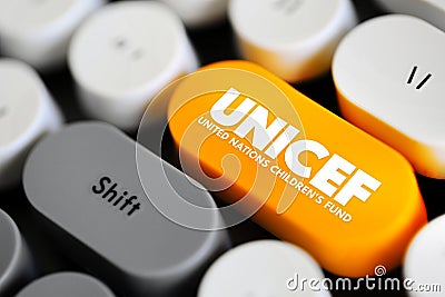 UNICEF is an agency responsible for providing humanitarian and developmental aid to children worldwide, text concept button on Stock Photo