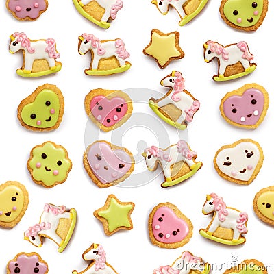 Unicorn and heart shaped sugar cookies decorated with pastel royal icing on white background Stock Photo