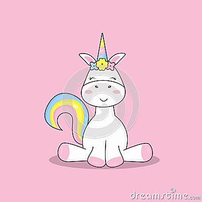 A unicorn sits with a rainbow tail Stock Photo