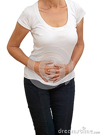 Unidentifiable older, mature woman with stomach pain, isolated on white background. Cramps, constipation etc. Stock Photo