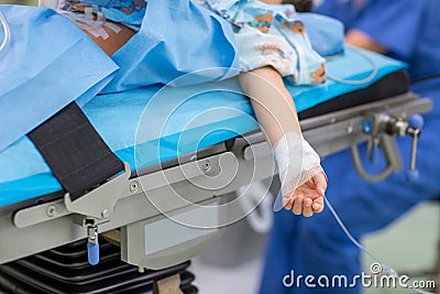 Unidentified child patient undergoing a surgery Stock Photo