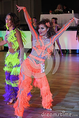 Unidentified female teens age 14-17 compete in latino dance on the Artistic Dance European Championship Editorial Stock Photo