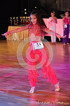 Unidentified female teens age 14-17 compete in latino dance on the Artistic Dance European Championship Editorial Stock Photo